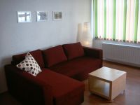 Alte Saitenfabrik - grüne Ferienwohnung 2 - Liebevoll eingerichteter Wohnbereich mit Aufbettungsmöglichkeit
